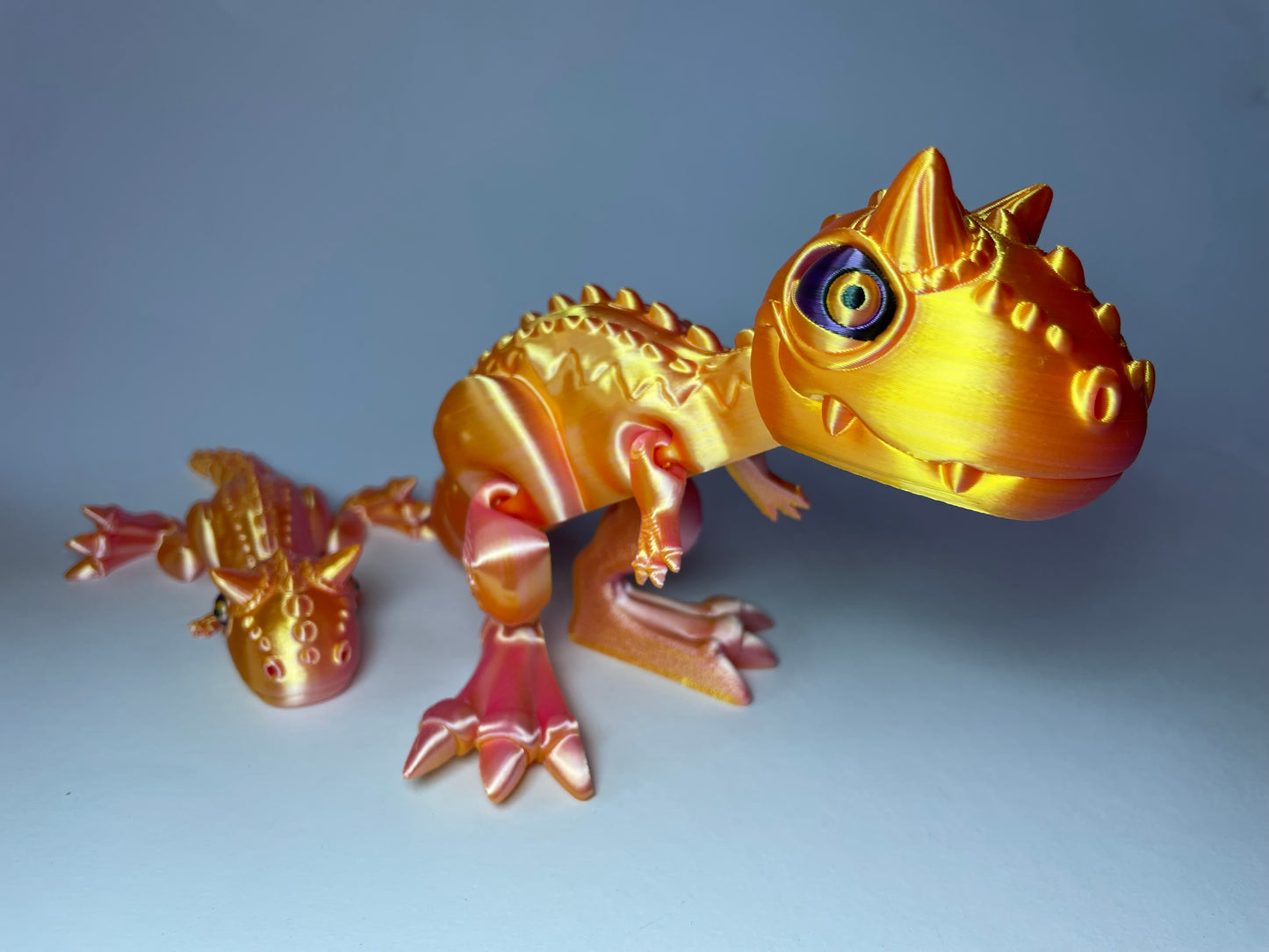 Carnotaurus – Flexi-Dino Figur | 3D-gedruckt mit PLA und PLA-Silk-Dual-Color · 3DruckAS
