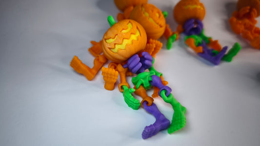 Flexi-Skelett-Kürbis Jackson – 3D-gedruckter Schlüsselanhänger aus PLA, beweglich (orange)