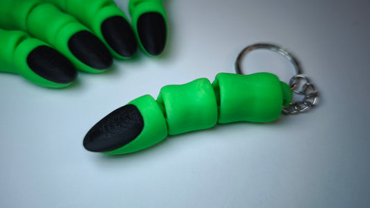 Flexi-Hexenfinger Witchi – 3D-gedruckter Schlüsselanhänger aus PLA, beweglich (grün)
