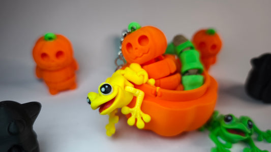 Flexi-Kürbis Kubi – 3D-gedruckter Schlüsselanhänger aus PLA, beweglich (orange)