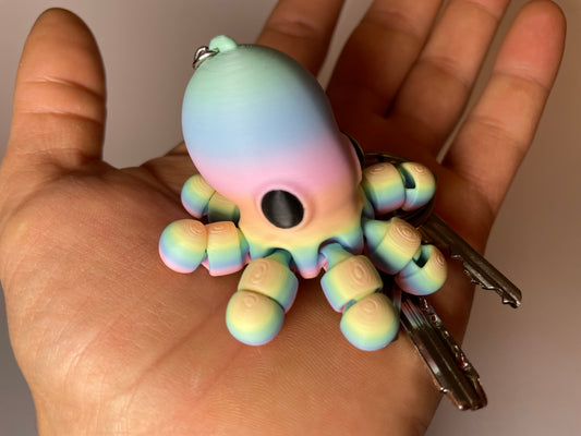 Flexi-Oktopus Oksana mit Pastell-Regenbogenverlauf als 3D-gedruckter Schlüsselanhänger