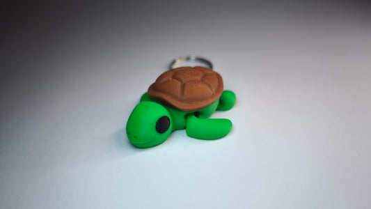 Flexi-Schildkröte Turbo – Schlüsselanhänger mit braunem Panzer
