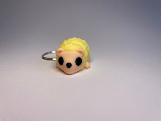 Schlüsselanhänger Lenny – flexibler Igel in Gelb im 3D-Druck