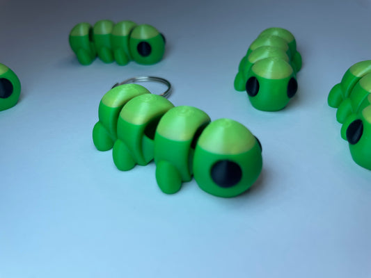 Flexi-Raupe Raupy als Schlüsselanhänger – 3D-gedruckt aus PLA, gefertigt im Allgäu.