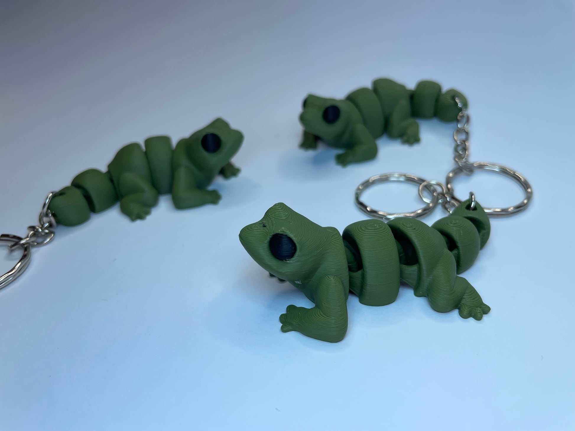 Lizzy die Flexi-Eidechse in Grün – PLA-3D-Schlüsselanhänger