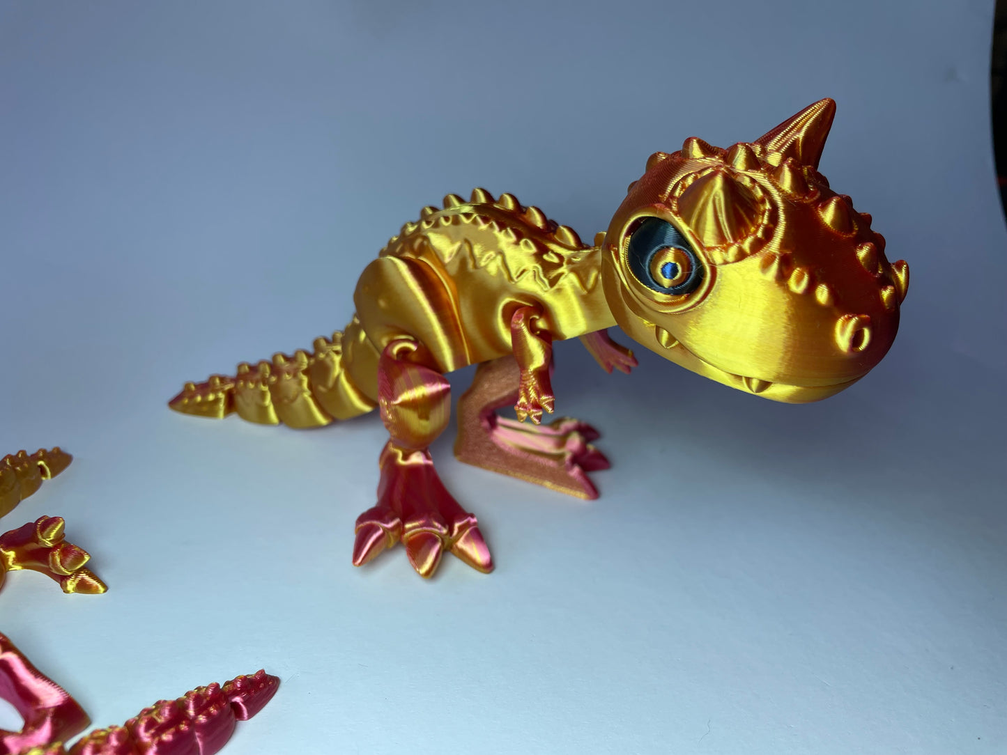 Little Carnotaurus – Flexi-Dino Figur | 3D-gedruckt mit PLA und PLA-Silk-Dual-Color · 3DruckAS