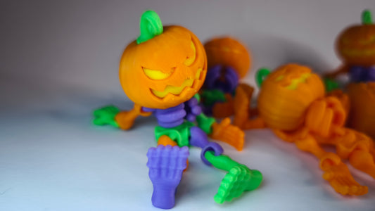 Flexi-Skelett-Kürbis Jackson – 3D-gedruckter Schlüsselanhänger aus PLA, beweglich (orange)