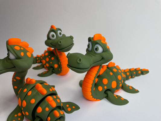 Mehrere 3D-gedruckte Flexi Figuren Günter – das freundliche Loch Ness Monster aus PLA, handgefertigt von 3DruckAS