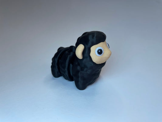 Adrian das Flexi-Schaf – 3D-gedruckter Schlüsselanhänger in Schwarz/Beige