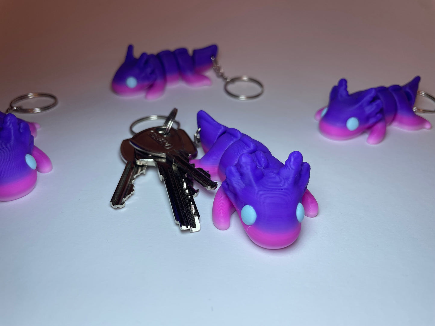 Flexi-Axolotl Mystica mit Lila-Pink-Farbverlauf als 3D-gedruckter Schlüsselanhänger