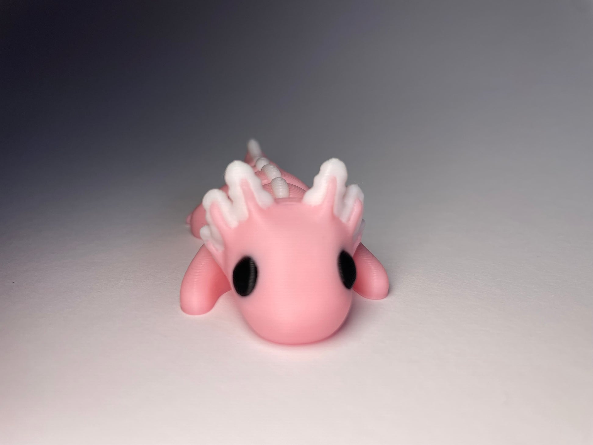 3D-gedruckter Flexi-Axolotl Rosalie als Schlüsselanhänger