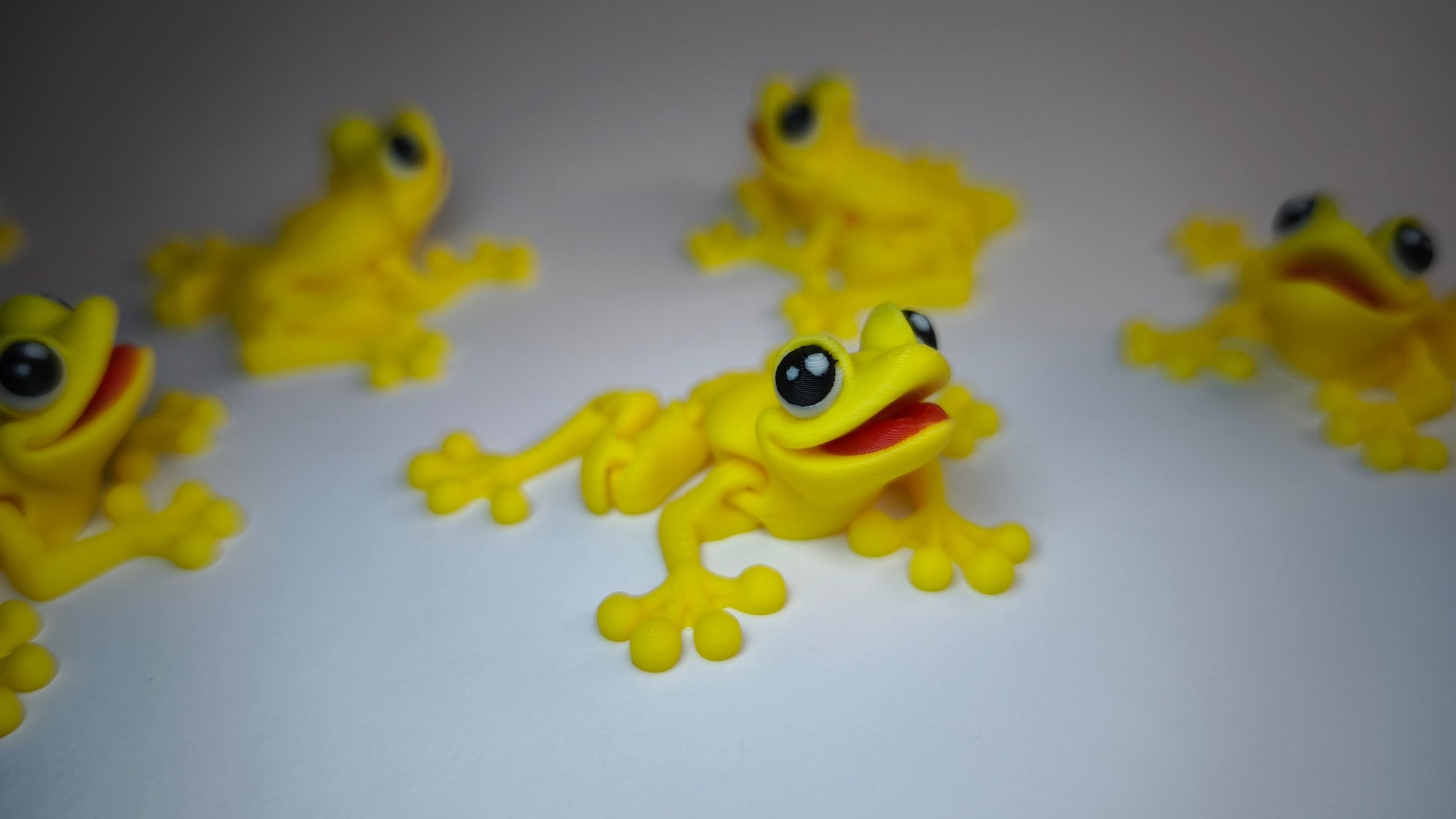 Franz der Flexi-Frosch – beweglicher Schlüsselanhänger in leuchtendem Gelb