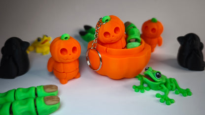 Flexi-Kürbis Kubi – 3D-gedruckter Schlüsselanhänger aus PLA, beweglich (orange)