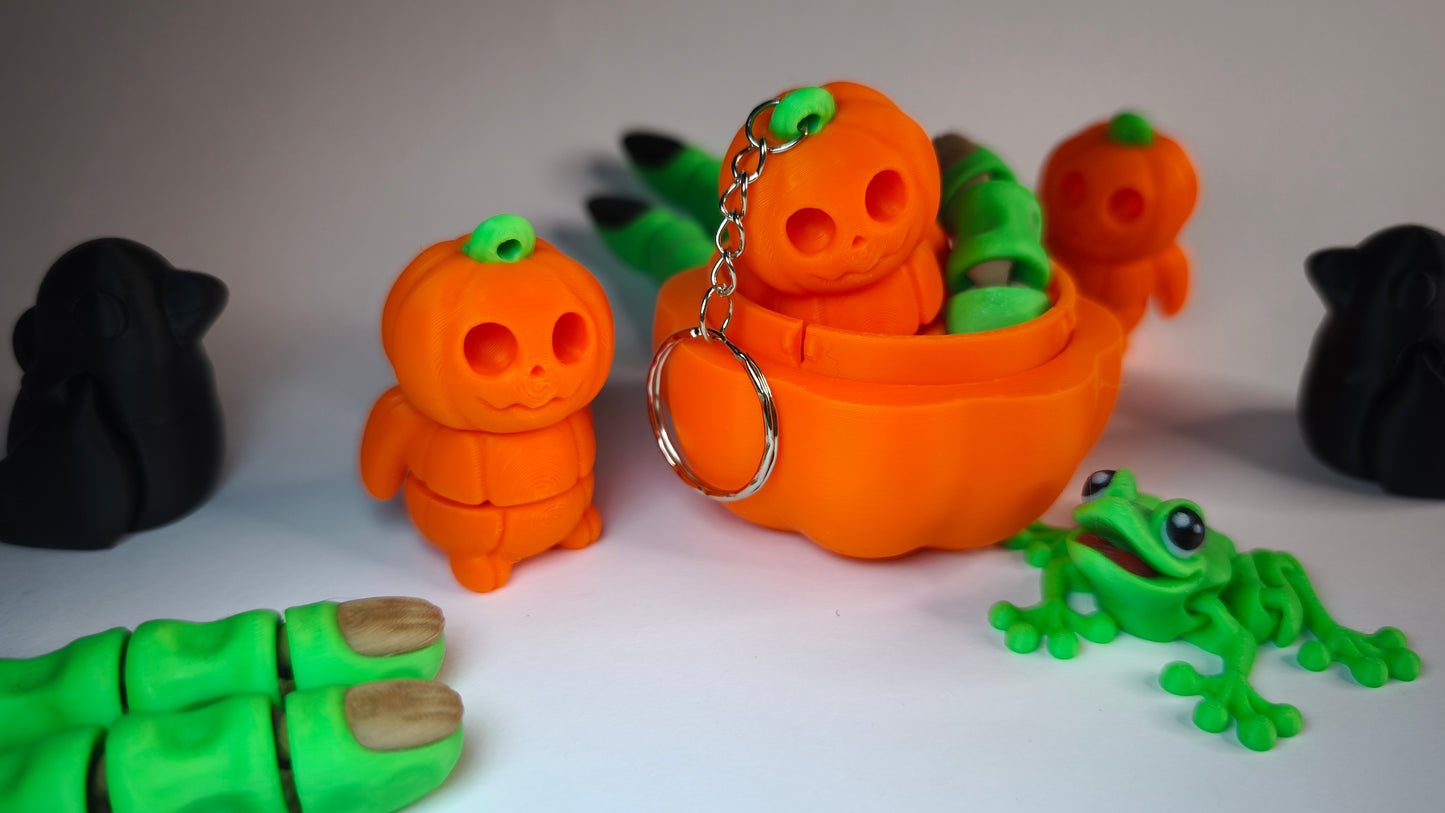 Flexi-Kürbis Kubi – 3D-gedruckter Schlüsselanhänger aus PLA, beweglich (orange)