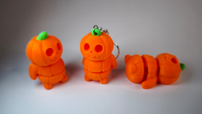Flexi-Kürbis Kubi – 3D-gedruckter Schlüsselanhänger aus PLA, beweglich (orange)
