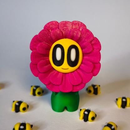 fluffy-3d-druck-blume-mit-gesicht in magenta