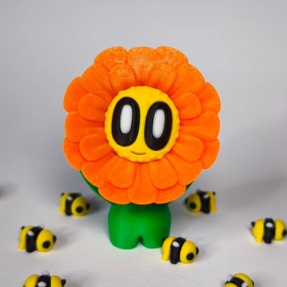 fluffy-3d-druck-blume-mit-gesicht in orange
