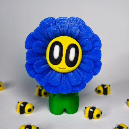 fluffy-3d-druck-blume-mit-gesicht in blau