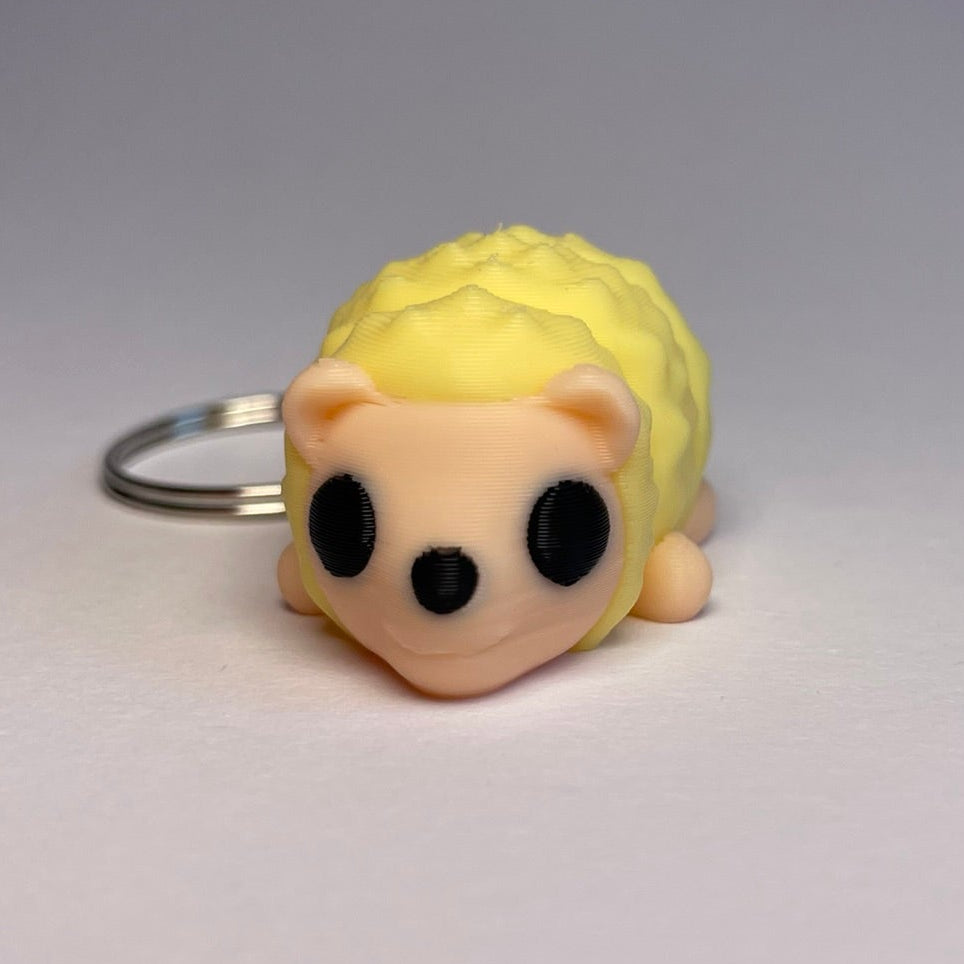 Schlüsselanhänger Lenny – flexibler Igel in Gelb im 3D-Druck