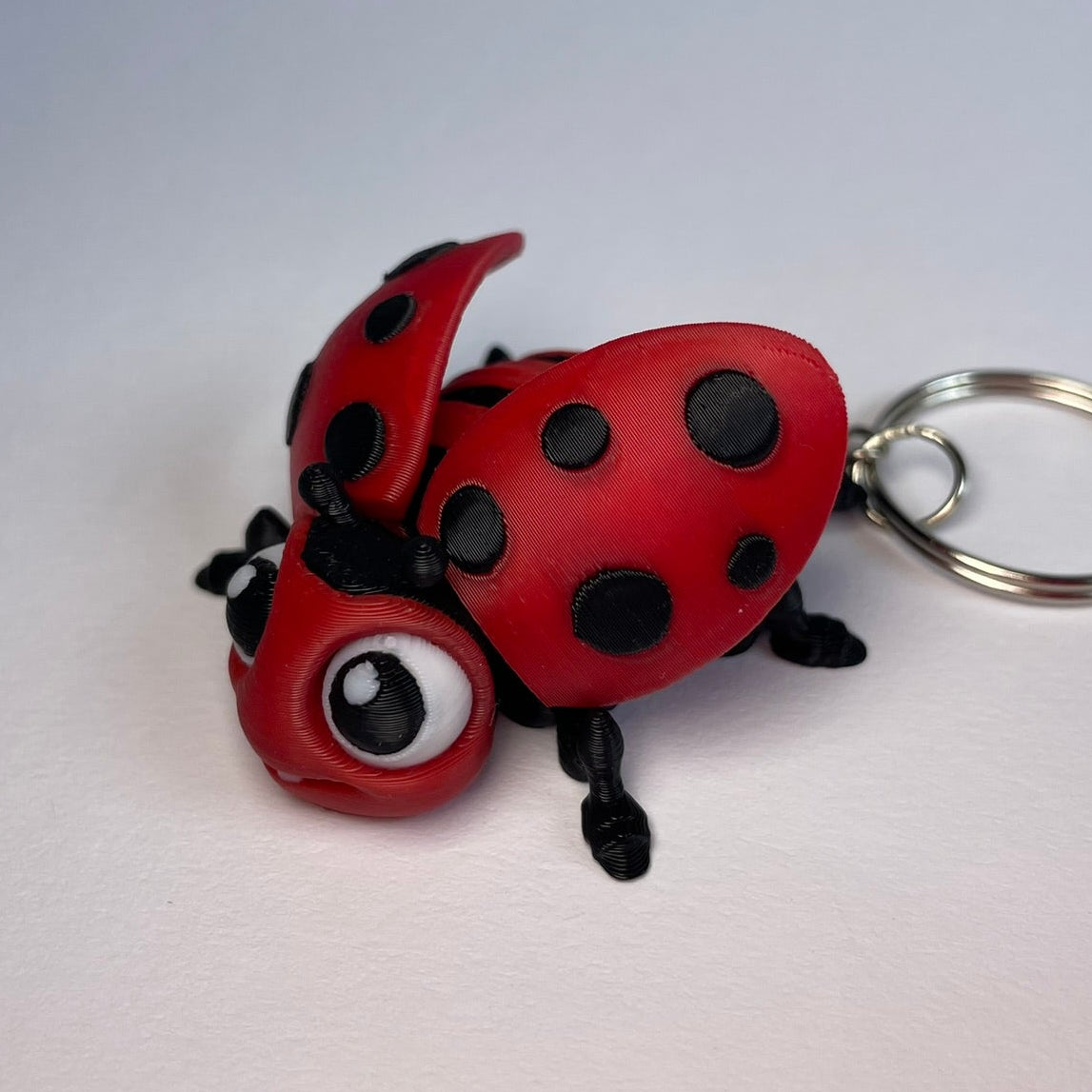 Mila – Marienkäfer Schlüsselanhänger, 3D-gedruckte Flexi-Figur