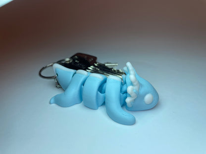 3D-gedruckte Flexi-Axolotl Figur in Hellblau mit Schlüsselanhänger