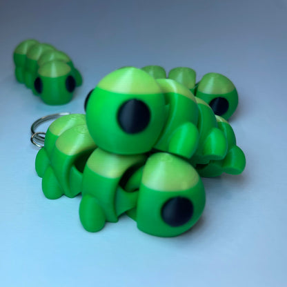 Bewegliche Mini-Raupe Raupy – Schlüsselanhänger aus PLA, originelles Geschenk für Naturfreunde.