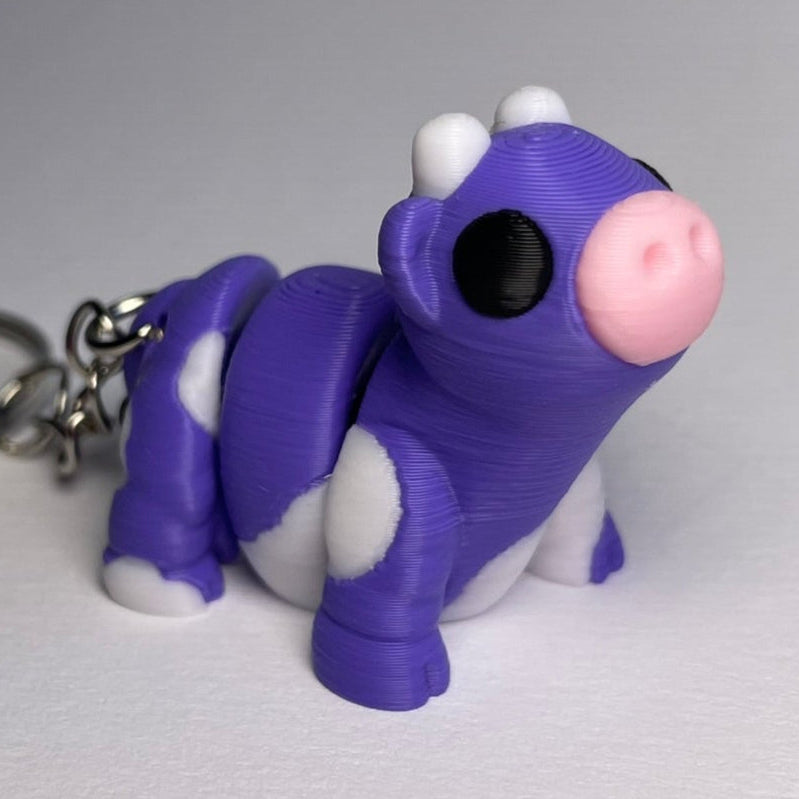 Rosi die lila Flexi-Kuh als 3D-Schlüsselanhänger Figur