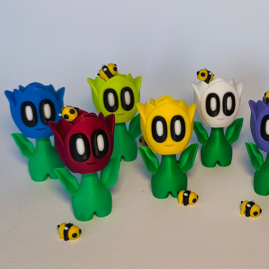 Farbenfrohe 3D-gedruckte Rosenblüte n ‚Rosi‘ mit Gesicht als Dekofigur aus PLA