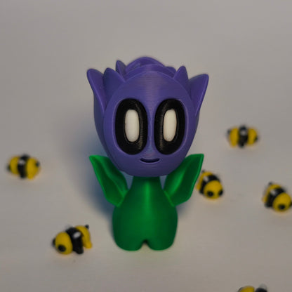 lila 3D-gedruckte Rosenblüte ‚Rosi‘ mit Gesicht als Dekofigur aus PLA