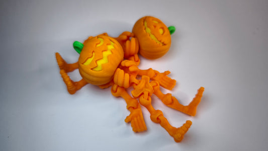 Flexi-Skelett-Kürbis Jacko – 3D-gedruckter Schlüsselanhänger aus PLA, beweglich (orange)