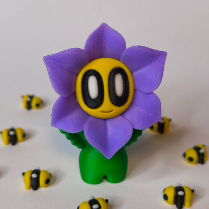 Violett 3D-gedruckte sternförmige Blume ‚Sternchen‘ mit Gesicht als Dekofigur in verschiedenen Farben