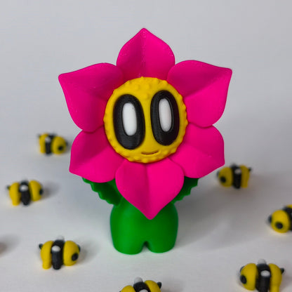 Magenta 3D-gedruckte sternförmige Blume ‚Sternchen‘ mit Gesicht als Dekofigur in verschiedenen Farben