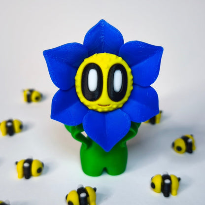 Blau 3D-gedruckte sternförmige Blume ‚Sternchen‘ mit Gesicht als Dekofigur in verschiedenen Farben