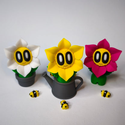 3D-gedruckte Blumen mit Gesicht als Dekofigur in verschiedenen Farben