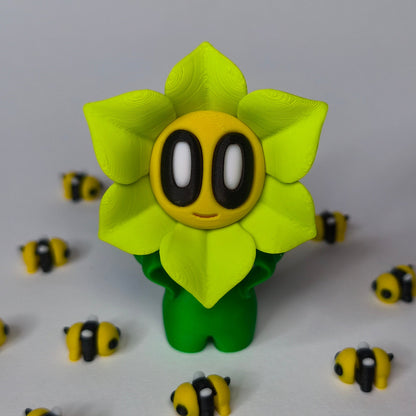 Grün 3D-gedruckte sternförmige Blume ‚Sternchen‘ mit Gesicht als Dekofigur in verschiedenen Farben