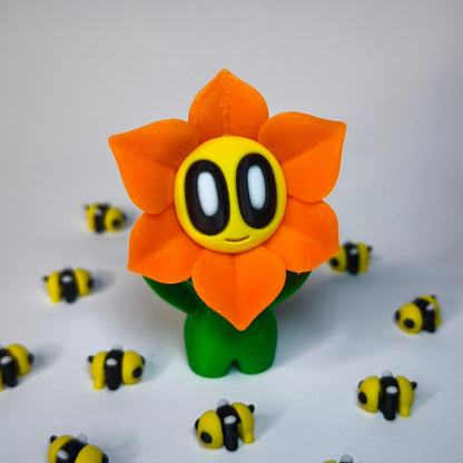 Orange 3D-gedruckte sternförmige Blume ‚Sternchen‘ mit Gesicht als Dekofigur in verschiedenen Farben