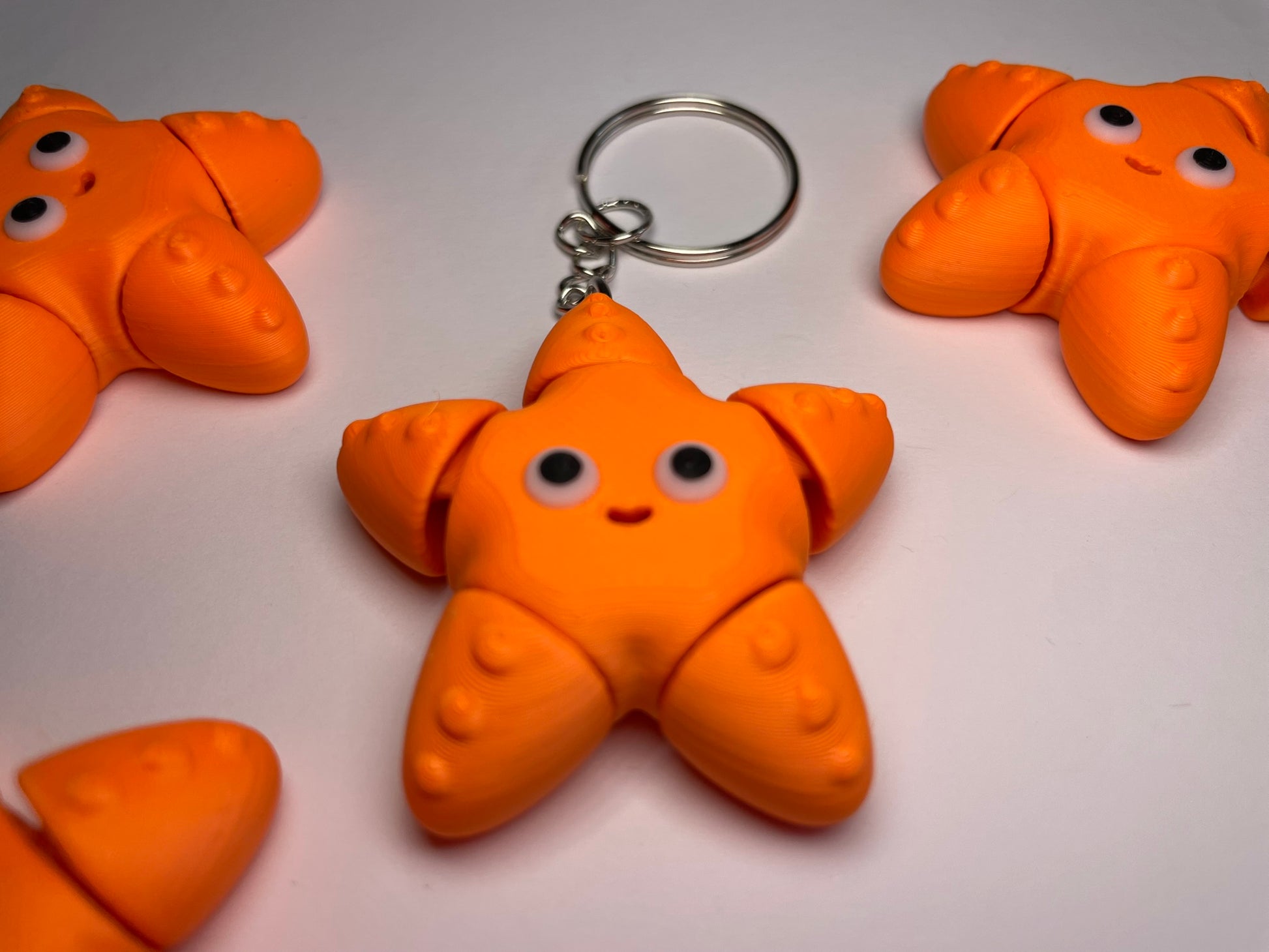 Flexi-Seestern „Sternchen“ aus PLA in Orange, dekorativ & beweglich