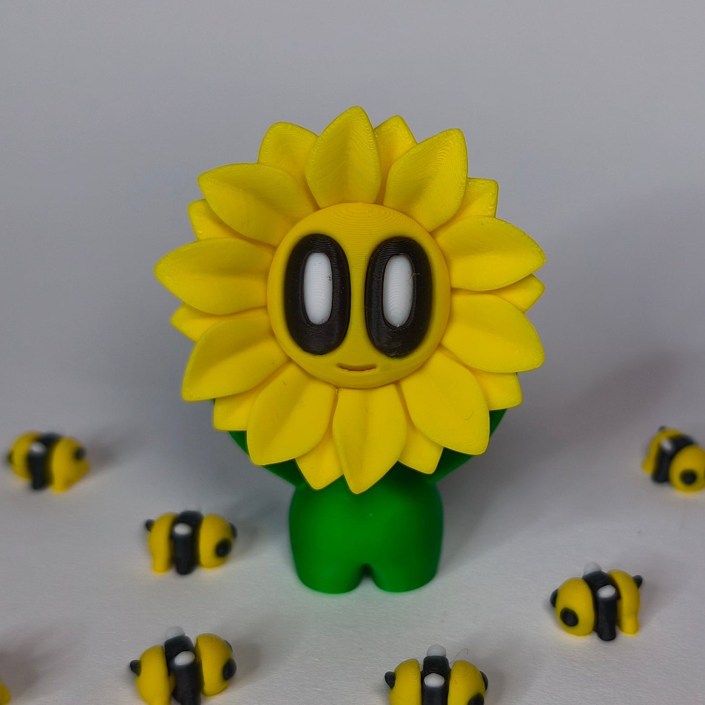 sunny-3d-druck-blume-mit-gesicht in gelb