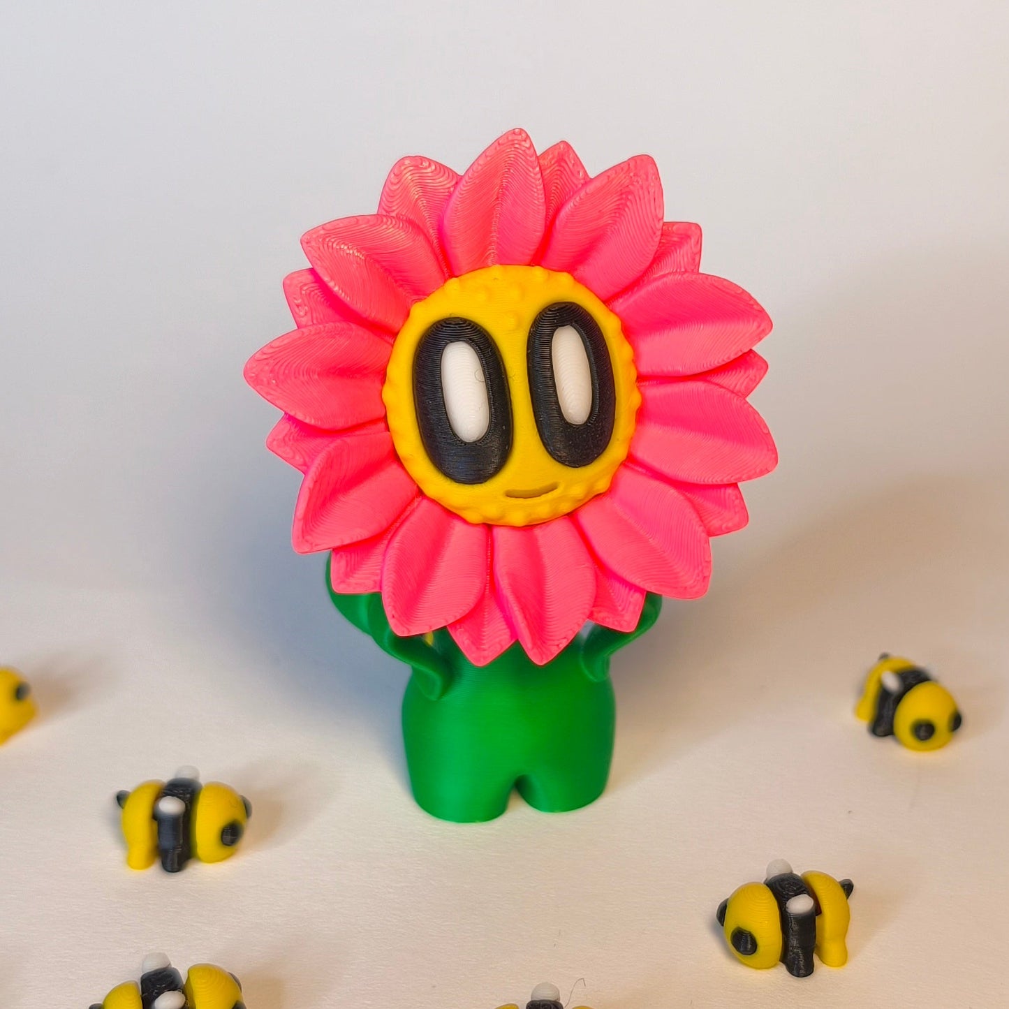 sunny-3d-druck-blume-mit-gesicht in rosa