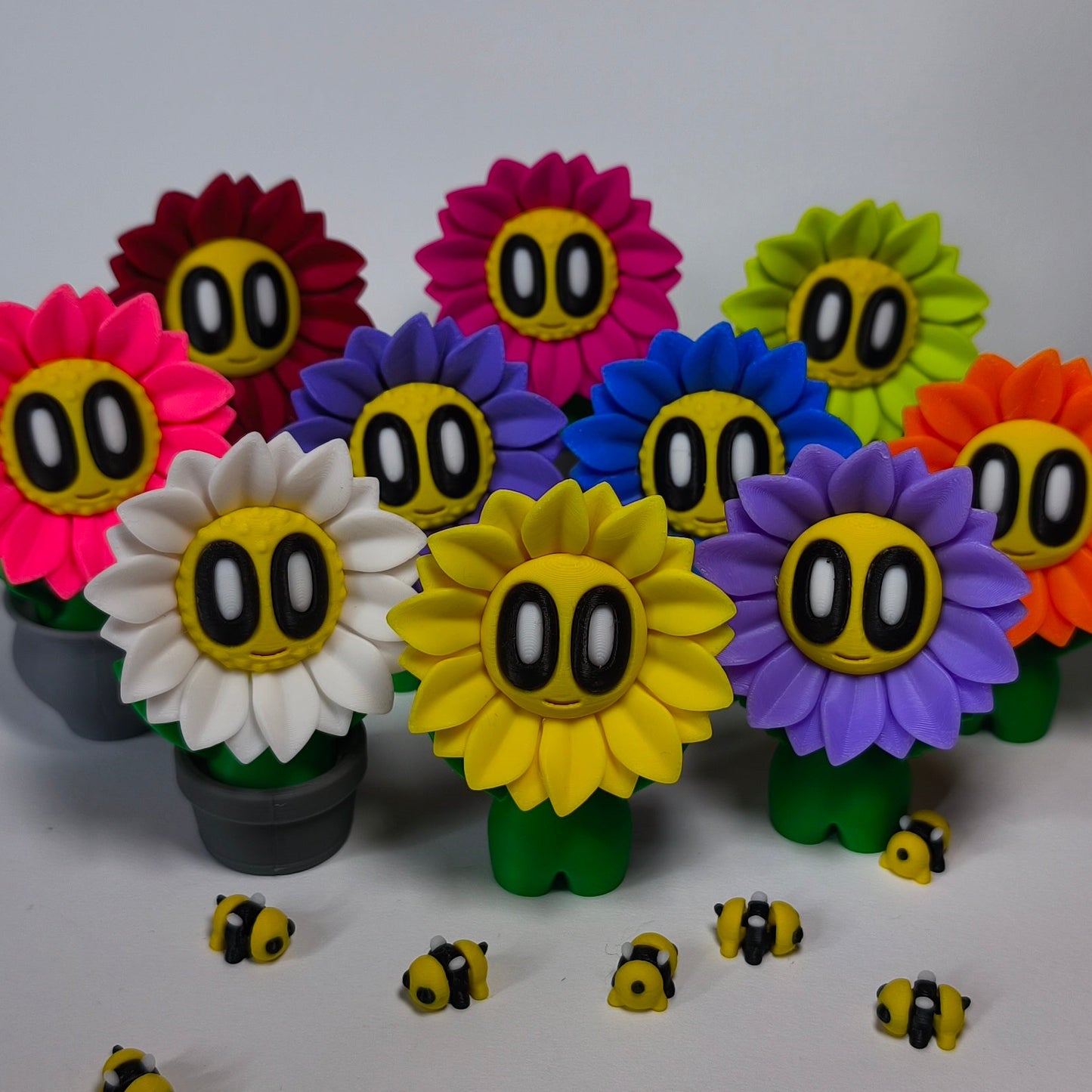 sunny-3d-druck-blumen-mit-gesicht in verschiedenen farben